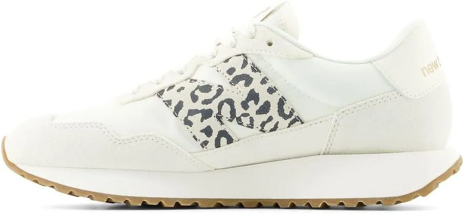 New Balance Women's 237 V1 Sneaker, Sea Salt/Black/Gold Metallic, 11